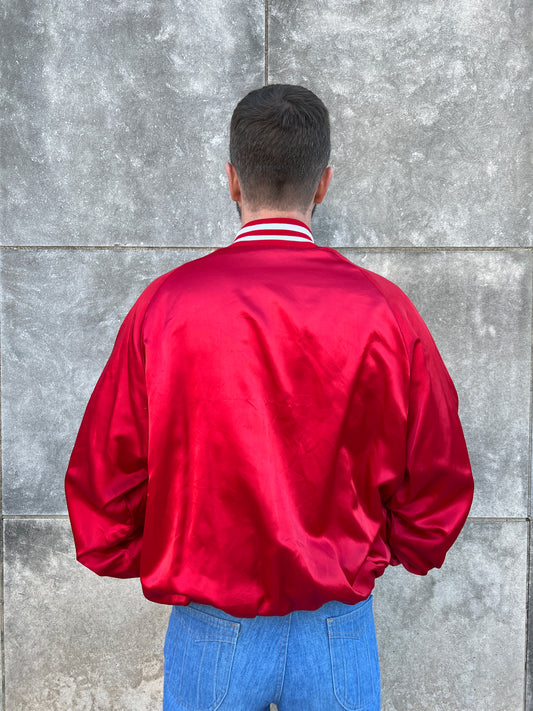 Back view on the model showing the red satin back and knit collar