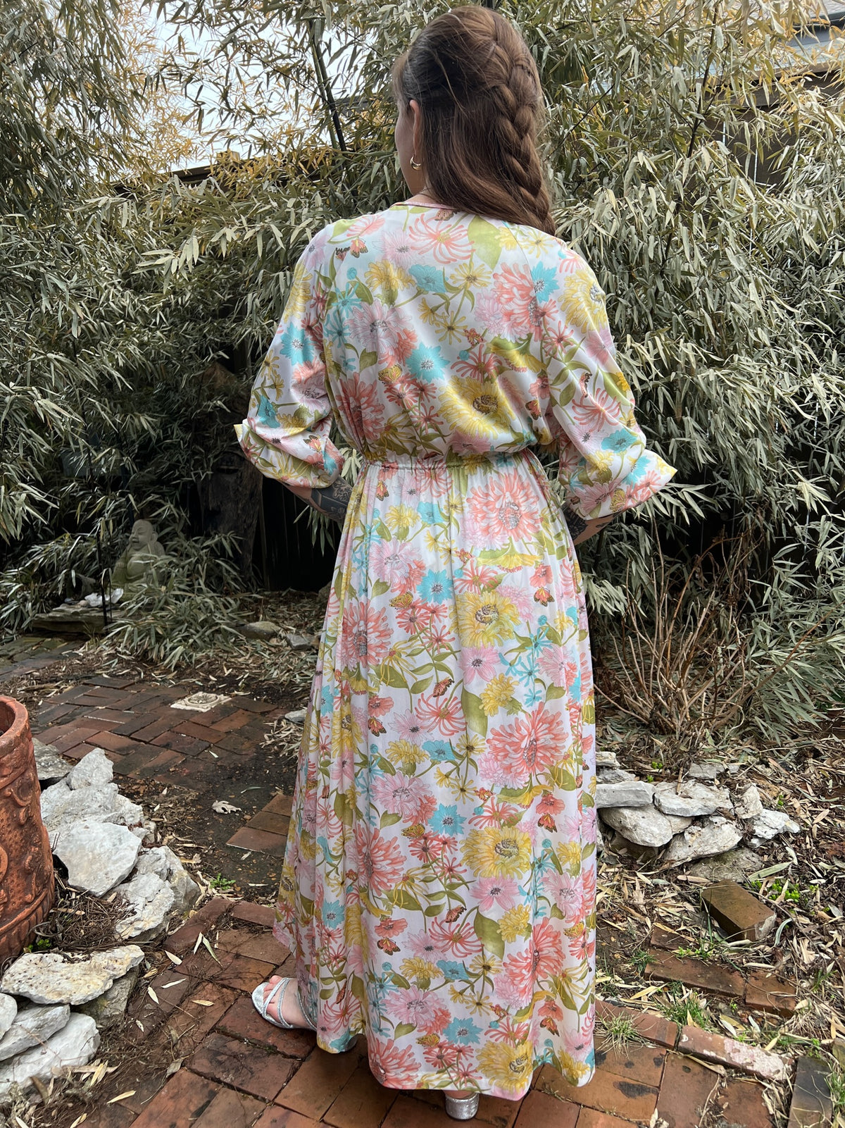 Back view of the robe on the model showing the waist and sleeves