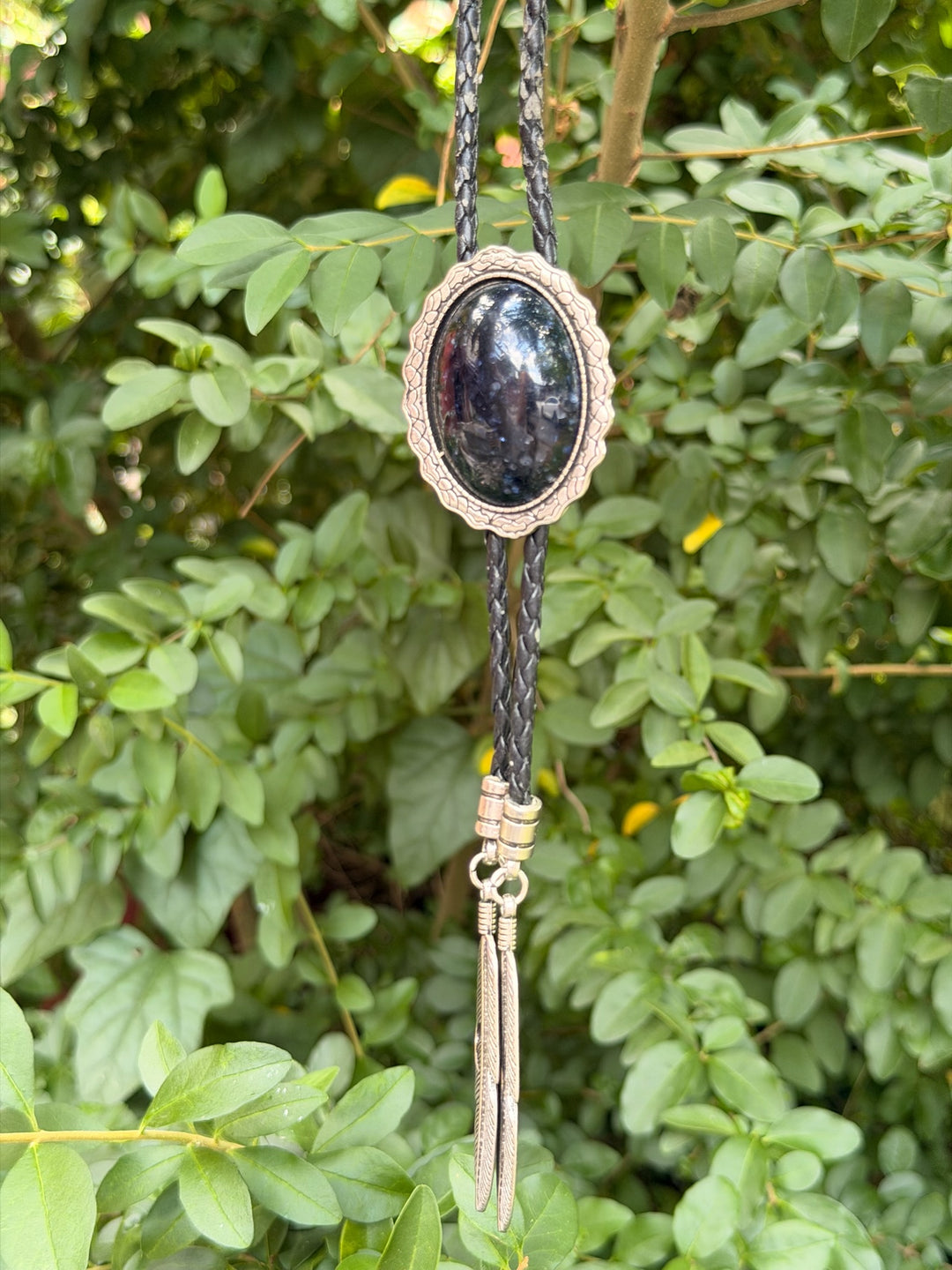 Black leather bolo tie Sparkly Black Oval, Feather Tips