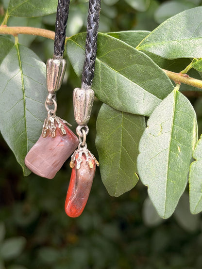 Close-up of the two tips, each a silver cap holding a semi-precious stone
