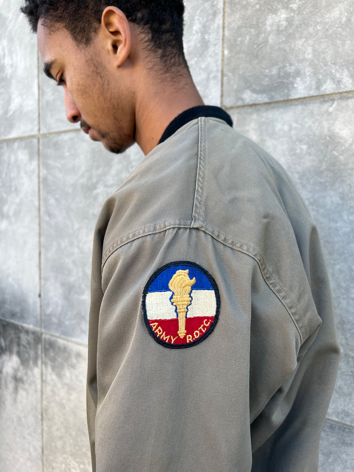 Close-up of the round ROTC patch on the sleeve