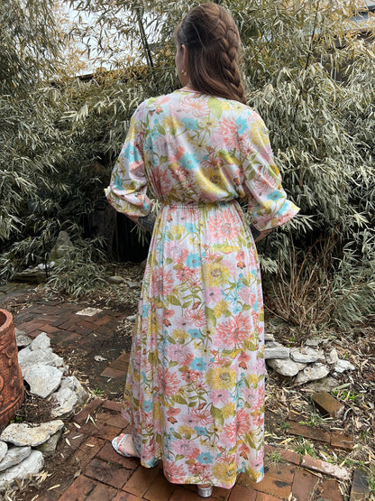 Back view of the robe on the model showing the waist and sleeves