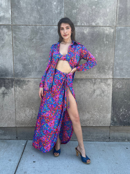 Bikini top and wrap skirt with the matching long-sleeve collared shirt worn open over it